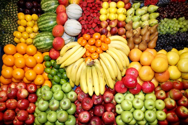 Freshly harvested collection of organic fruits as background — Stock Photo, Image