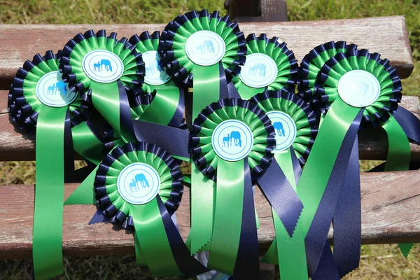 Pile of colorful ribbons for prize winner horse breeders