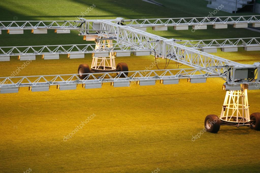 Lighting rig system for growing grass and lawn at stadium Stock Photo by ©accept001 68527673
