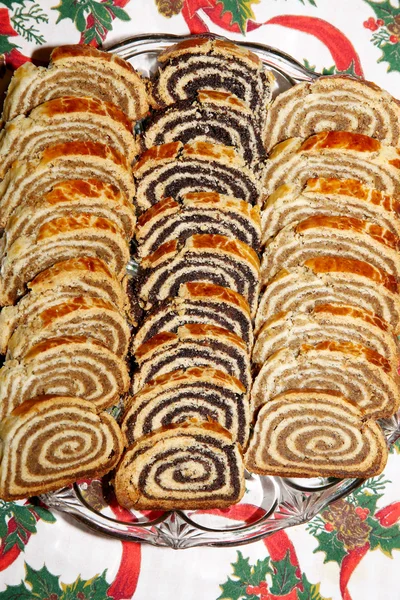 Some pieces of traditional hungarian cake poppy rolls beigli — Stock Photo, Image
