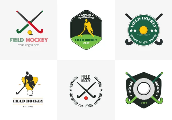 Veld hockey logo set. Vector sport badges met man silhouet, stick en bal. — Stockvector