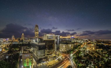 Panorama shot of Sandton City Johannesburg at night in Gauteng South Africa clipart