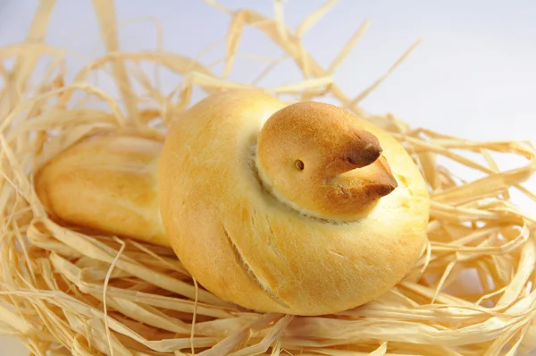 Festive bird bread on a nest — Stock Photo, Image