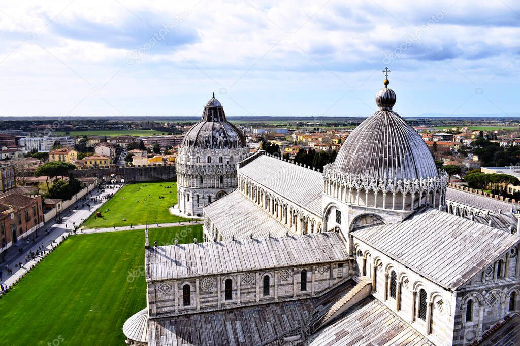 View of santa maria assunta cathedral, baptistry of st john and cityscape from the top of the leaning tower of pisa, italy