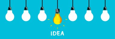 Mavi arka planda yaratıcı ampul, kavram olarak yeni fikir.