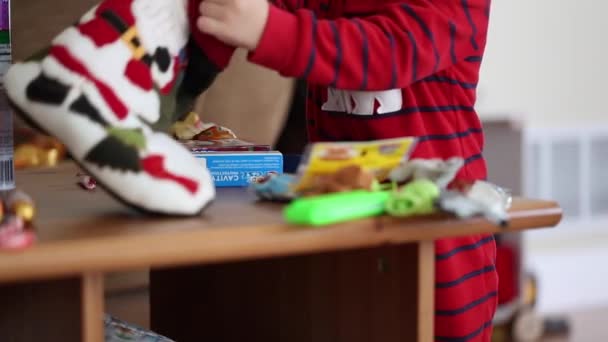 Boy and christmas stocking — Stock Video