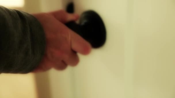 Person using a door knob — Stock Video