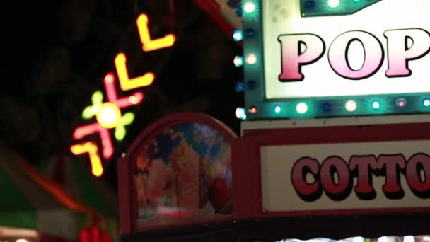A popcorn and cotton candy sign — Stock Video