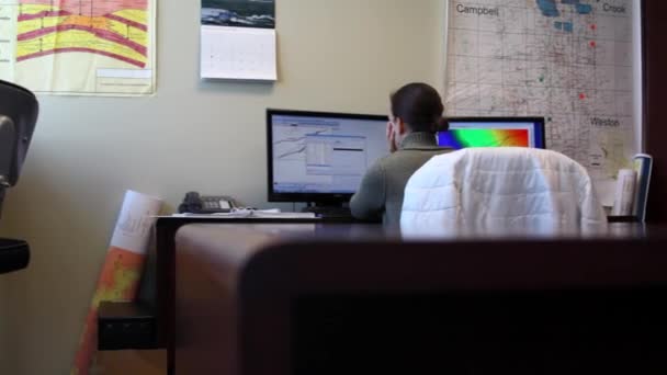 Woman with baby at work — Stock Video