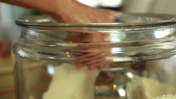 Woman measuring flour — Stock Video