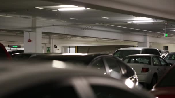 Cars inside parking garage — Stock Video