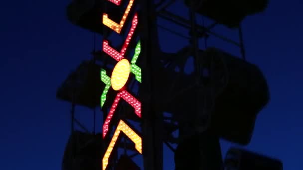 Carnival rides in an amusement park — Stock Video