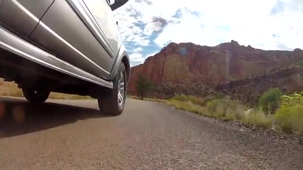 Suv driving through capitol reef — Stock Video