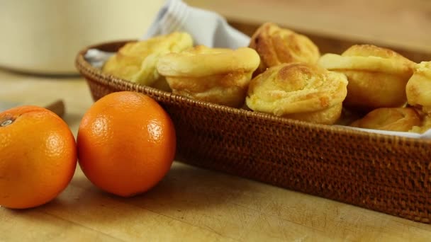 Freshly baked orange rolls — Stock Video