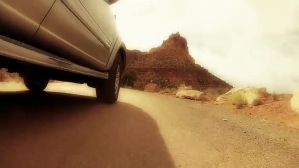 Suv driving through capitol reef — Stock Video