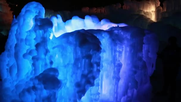 Colorful ice castle in the winter — Stock Video