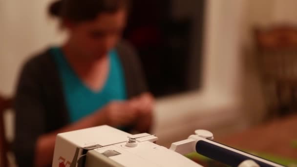 A woman sewing a christmas calendar — Stock Video