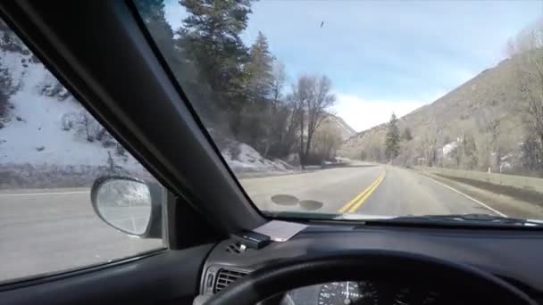 Driving car down mountain road — Stock Video