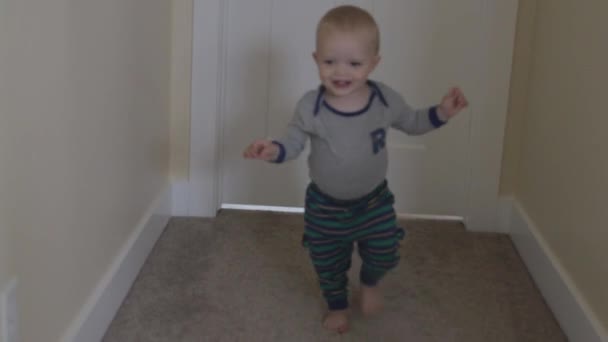 Boy walking around house — Stock Video