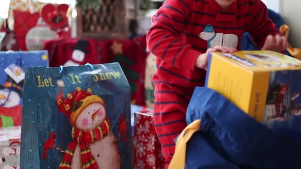 Menino brincando com seu brinquedo — Vídeo de Stock