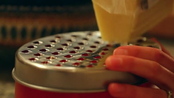 Grating parmesan cheese — Stock Video