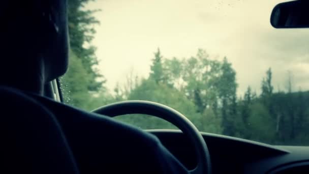 Driving over a mountain road in rain — Stock Video