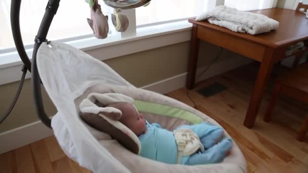 Boy sleeping in swing — Stock Video