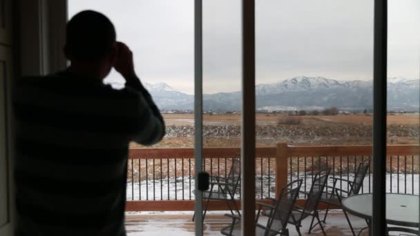 Man looking through binoculars — Stock Video