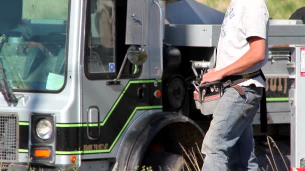 Man Controlling Cement Pump Truck — Stock Video