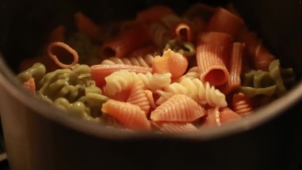 Noodles cooking in a pot — Stock Video