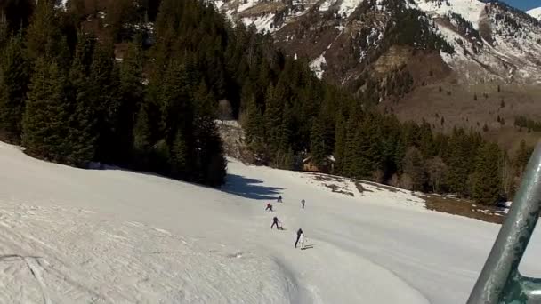 Men skiing in spring — Stock Video