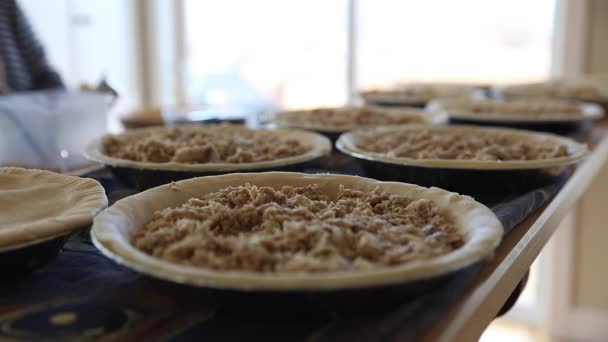 Woman cooking meat pies — Stock Video