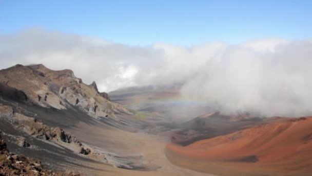 Rainbow hovers over crater — Stock Video