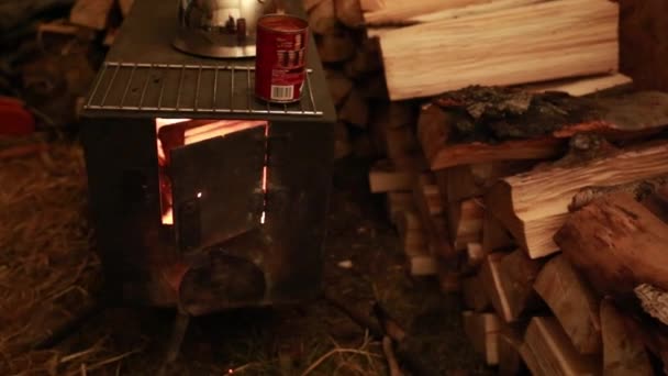 Wood stove in a tent — Stockvideo