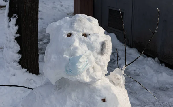 Snowman in a medical mask corona virus — Stock Photo, Image