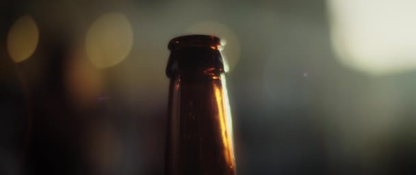 Close up of a dark glass bottle — Stock Video