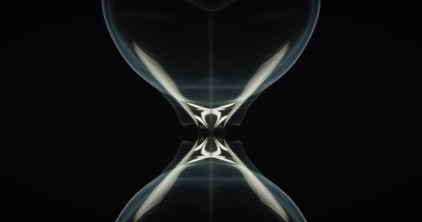 Abstract shot of sand pour in hourglass — Stock Video
