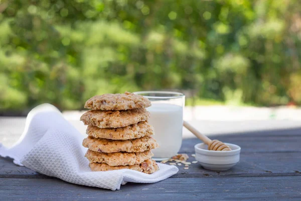 Oatmeal Cookies Walnuts Lie Stack Kitchen Towel Wooden Table Milk — Stock Photo, Image