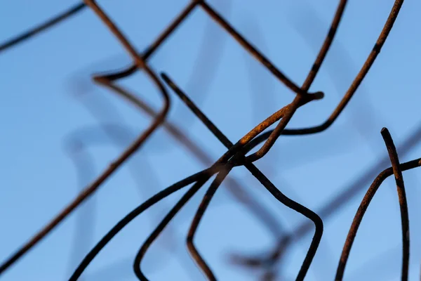 Close up of Old Wire Fence and Blue Sky — стоковое фото