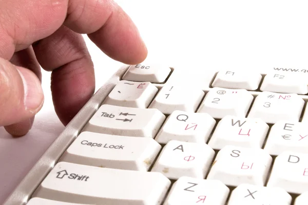 Hombre dedo presionando la tecla de escape en el teclado — Foto de Stock