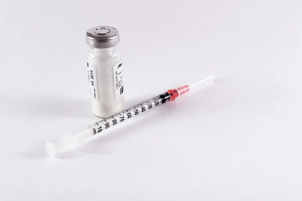 Medicine and Hypodermic Syring — Stock Photo, Image