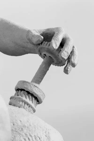 Stone Statue Human Hand and Industrial Cog — Stock Photo, Image
