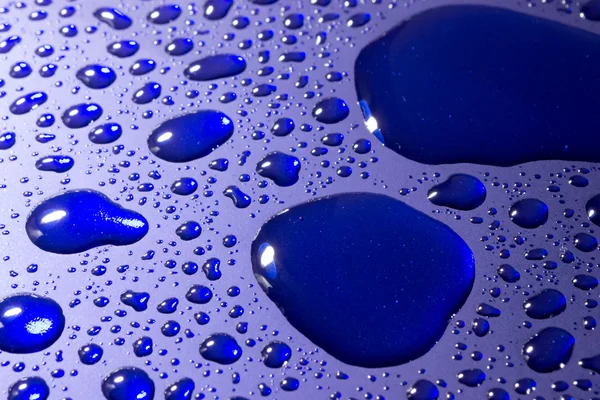 Water Droplets on Blue Number Four — Stock Photo, Image