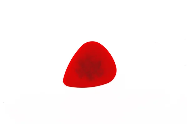 Single Red Guitar Plectrum — Stock Photo, Image