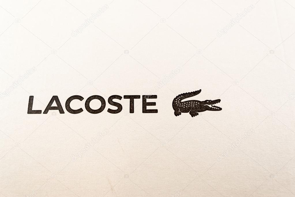 Classic Lacoste logo and icon and white cardboard