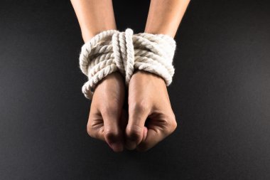 Female Hands Bound in Bondage with Rope clipart