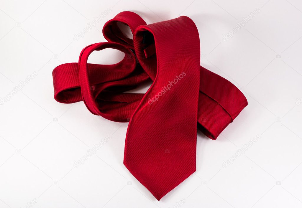 Crumpled Red Silk Tie on White Horizontal Background