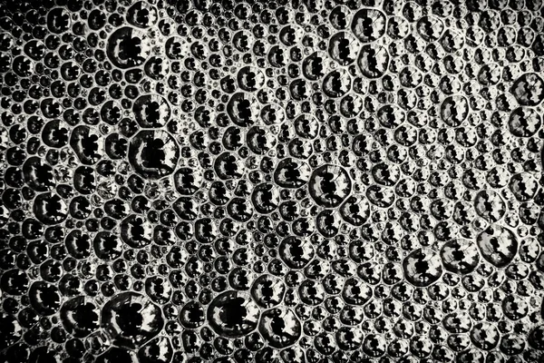 Bulles de mousse sur la surface de l'eau — Photo