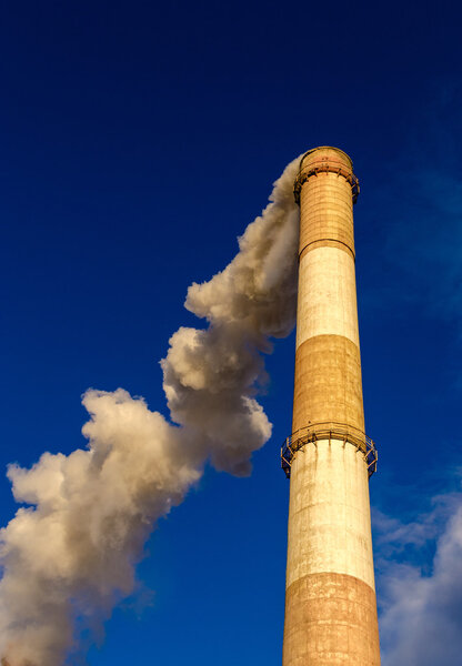 Huge Industrial Chimney and Smoke