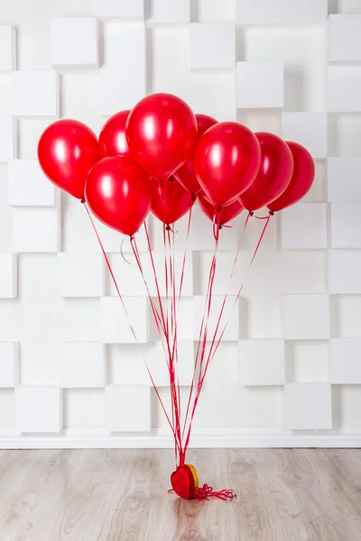 Red balloons in the room — Stock Photo, Image